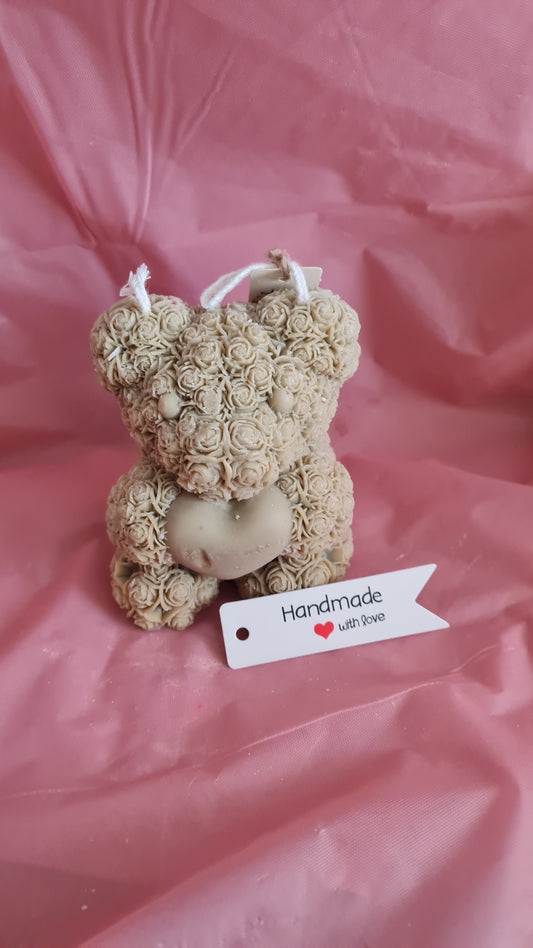 Teddy bear with a pattern of roses holding a heart in its paws (266g)