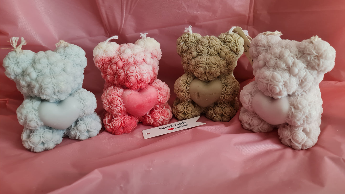 Teddy bear with a pattern of roses holding a heart in its paws (266g)