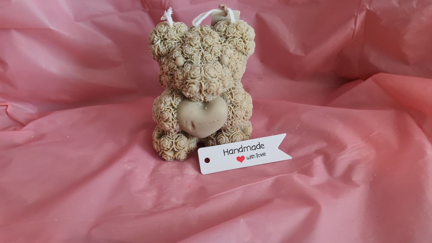 Teddy bear with a pattern of roses holding a heart in its paws (266g)