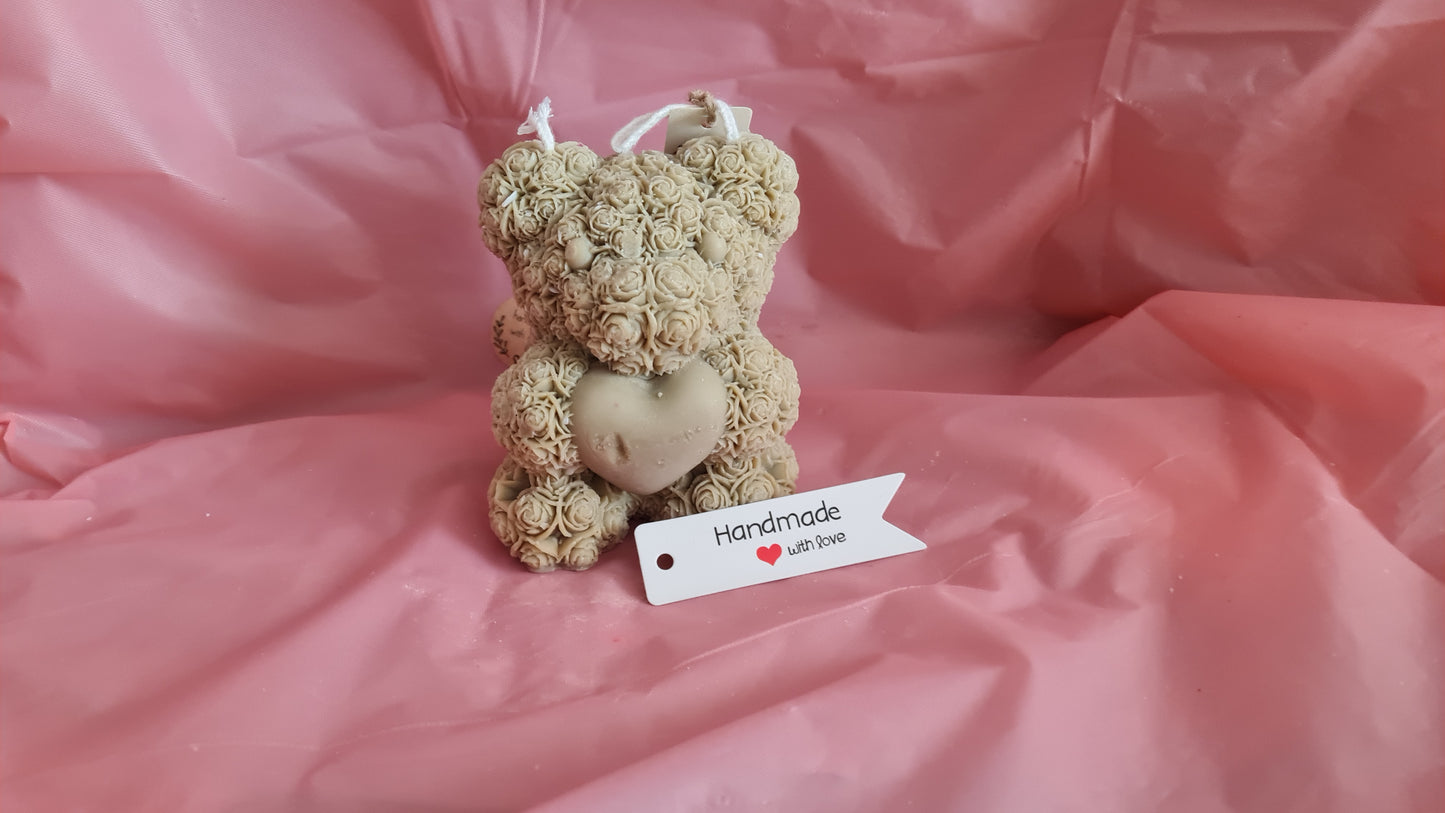 Teddy bear with a pattern of roses holding a heart in its paws (266g)