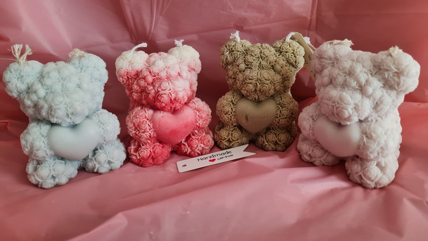 Teddy bear with a pattern of roses holding a heart in its paws (266g)